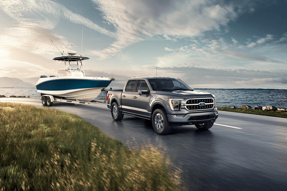 Ford F-150 Towing a boat along the coast