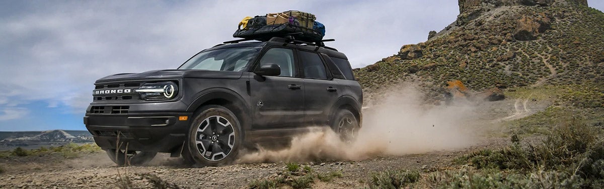 Ford Bronco Sport driving on dusty trail