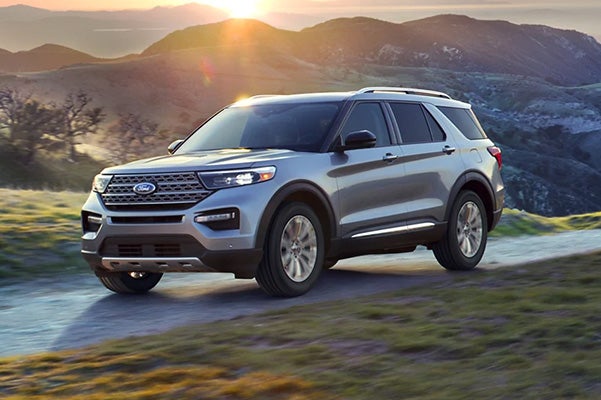 2021 Ford Explorer diriving by mountains