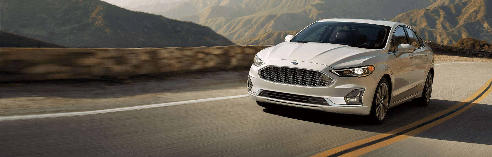 Ford Fusion driving on highway