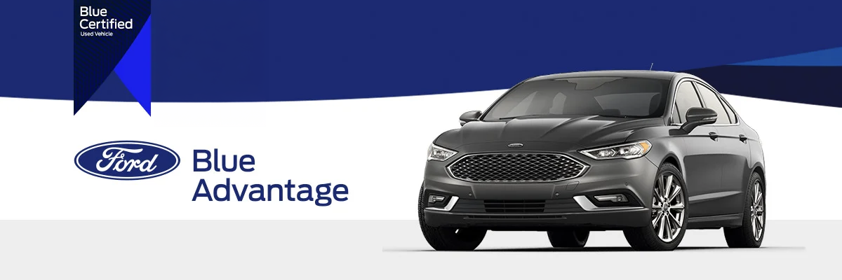 Ford Blue Advantage logo with 2018 Ford Fusion on a blue geometric background